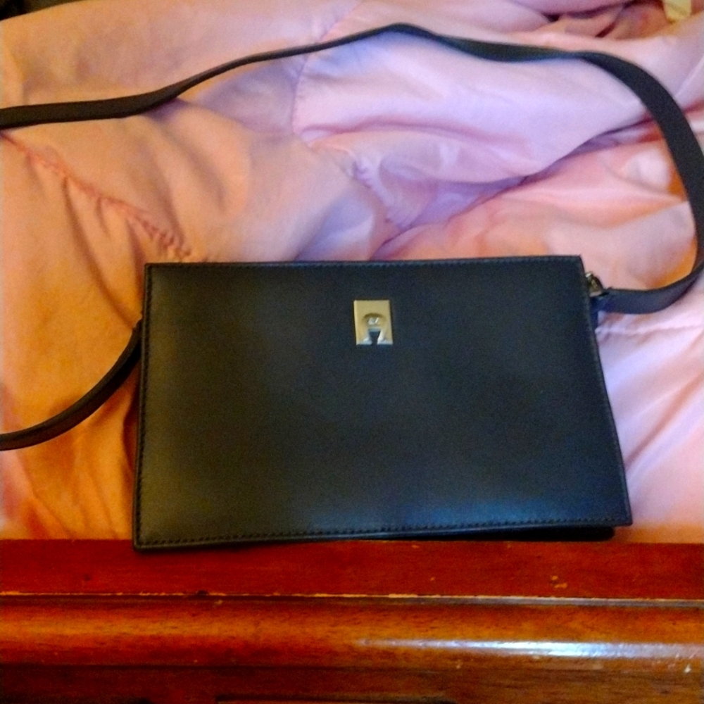 Etienne Aigner purse. Black leather cross body purse.